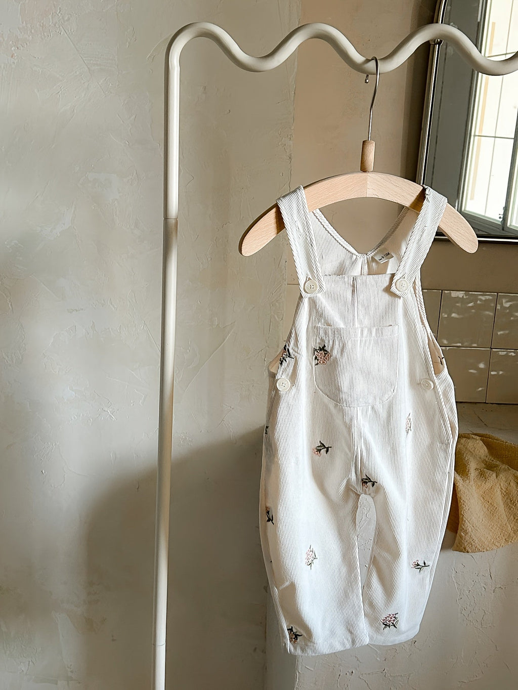 Baby Girls' Ivory Floral Overalls with an Embroidered Bib Pocket and Buttoned Straps for Layered Outfits