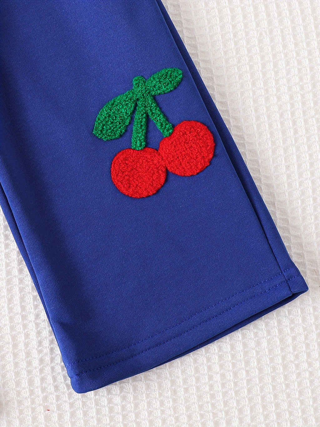 Girls' Blue Pants Set with Textured Cherry Appliques on a Crew Neck Sweatshirt and Wide Leg Trousers